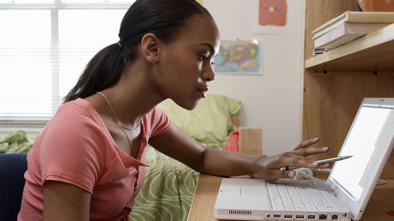 Young woman is working from home